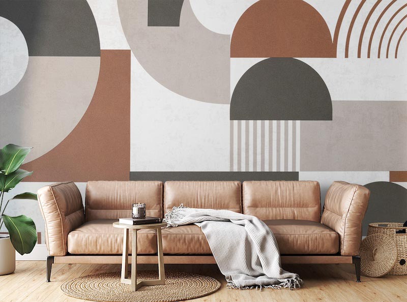 Earth-toned abstract forms arranged across the mural