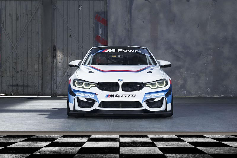 BMW GT4 racing car with dramatic lighting and motorsport details