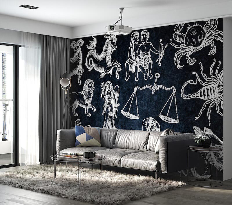 Hand-drawn astrology symbols and celestial elements on a neutral background