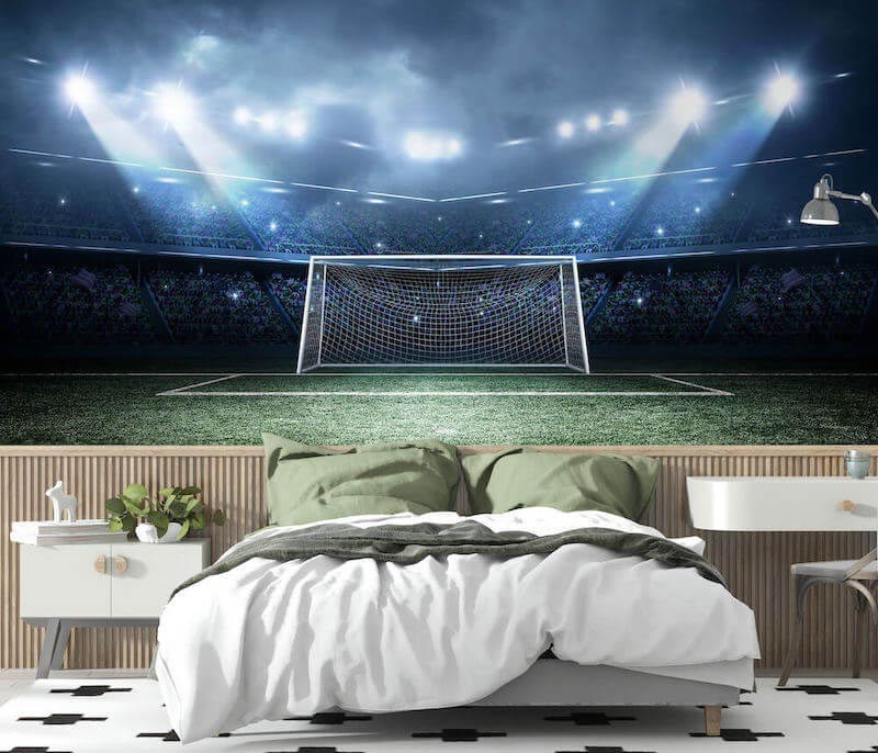 Green football field under bright stadium lighting
